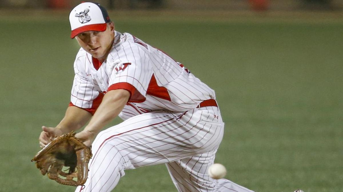 
The Wingnuts' third baseman T.J. Mittelstaedt fields a grounder against Sioux Falls in the ninth inning Tuesday at Lawrence-Dumopnt Stadium. The Wingnuts won 7-2. 
