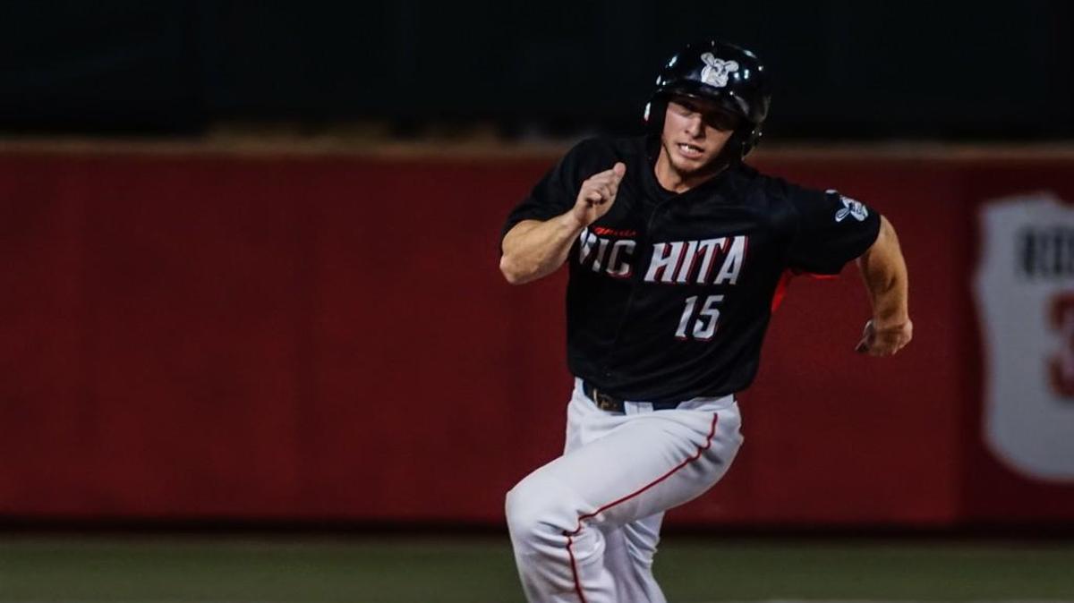The Wingnuts’ T.J. Mittelstaedt rounds second base and heads to third during the second inning Saturday evening at Lawrence-Dumont Stadium.