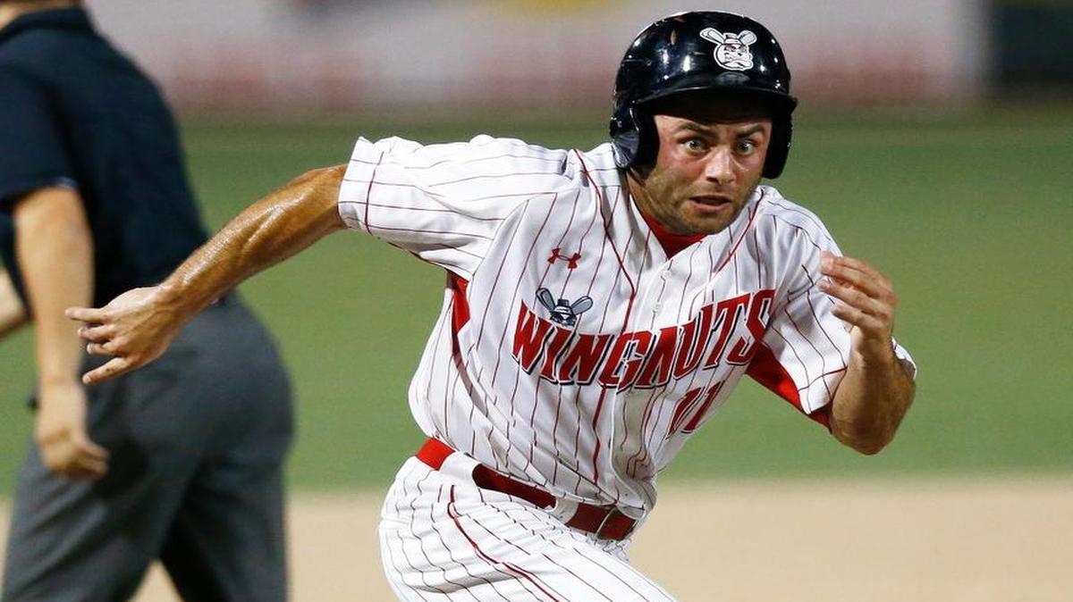 
The Wingnuts Harrison Kain spots a loose ball rounding third base and heads for home in the fourth inning Wednesday night against the Saints. Kain was called out at the plate. 
