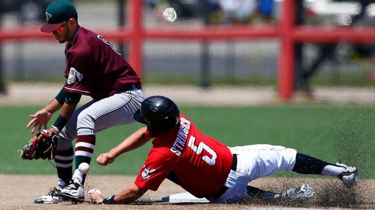The Wingnuts’ Christian Stringer slides safely into second base on June 5 at Lawrence-Dumont Stadium.
