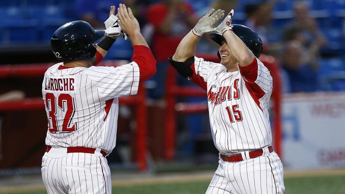 
The Wingnuts' T.J. Mittelstaedt, right, celebrates his two-run home run with teammate Andy LaRoche in the fourth inning Saturday night against Laredo. 
