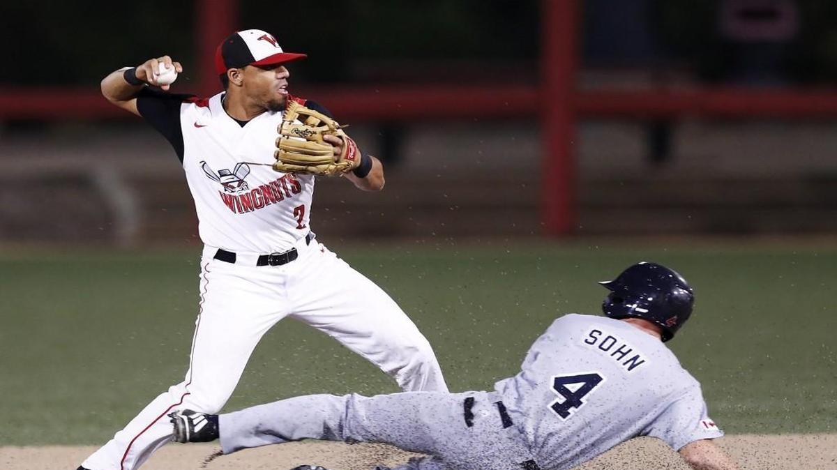 Wingnuts shortstop Leo Vargas turns a double play earlier in the American Association championship series.