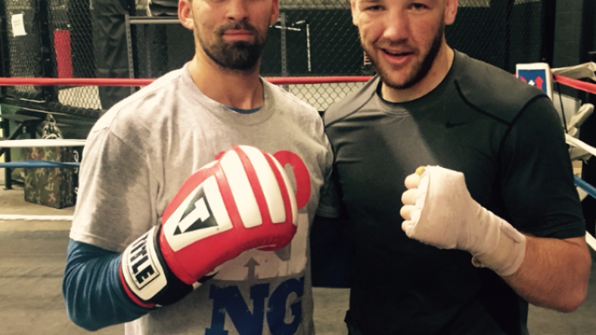 Andover native and professional boxer Jeff Page Jr., left, poses after a training session with Blake Capparello, right, in Australia in September.