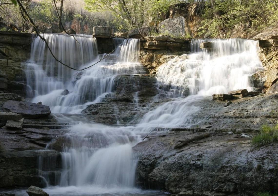 Several sets of waterfalls are created when water flows from Chase State Fishing Lake, near Cottonwood Falls.
