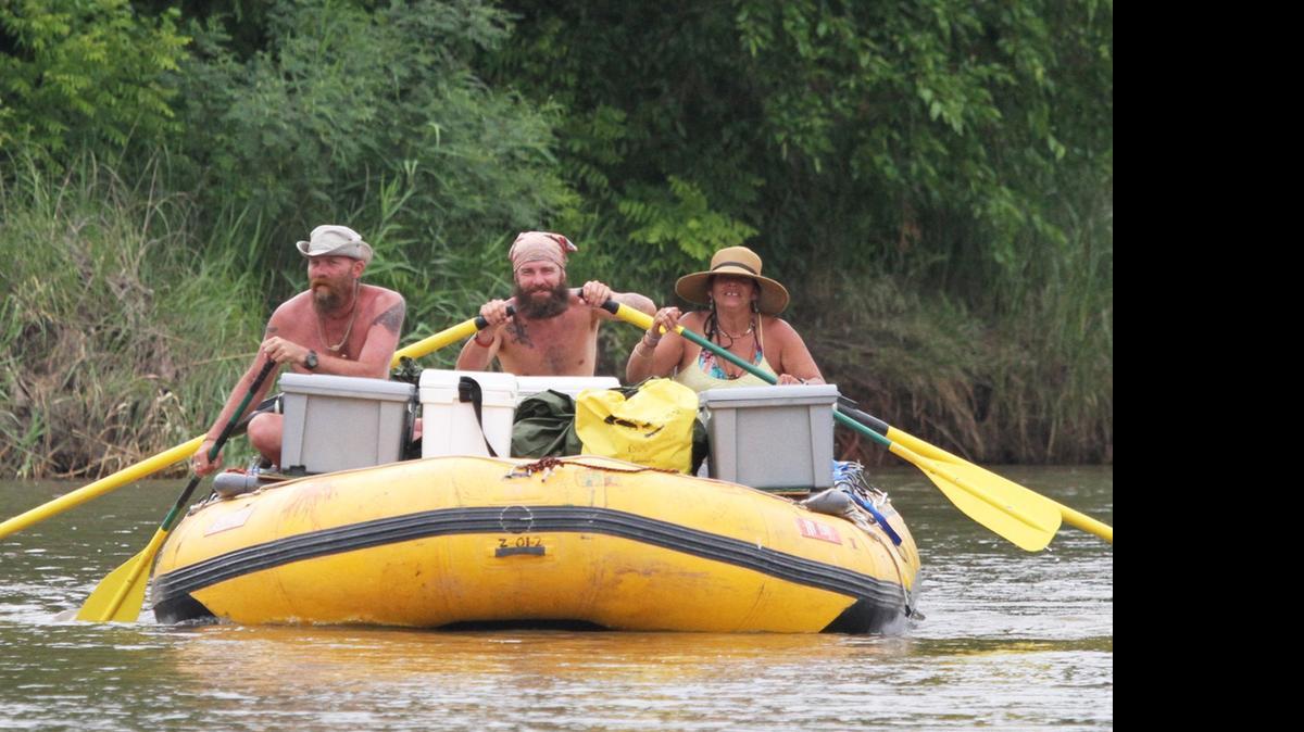 
Coloradans Donny Knowles, left, Jordan Miller and Susana Sierra, hope to raft on the Arkansas River from Great Bend to the Mississippi River. Miller thinks it should take about three months. Tuesday afternoon they passed through Hutchinson.
