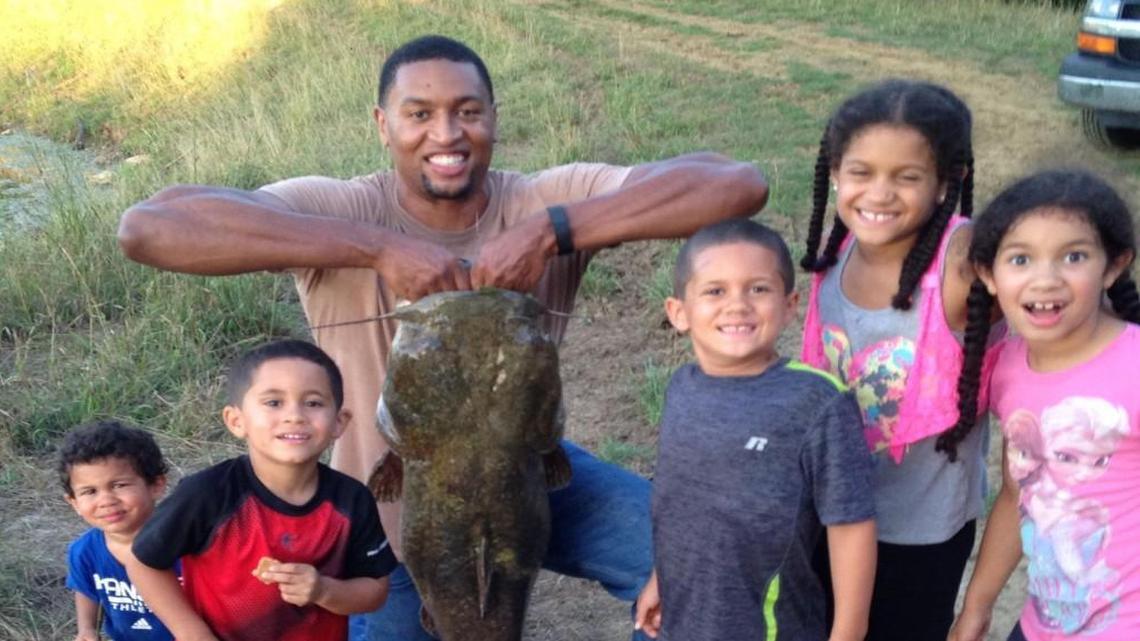 Two-year-old hooks giant catfish, but it took three generations to get it in