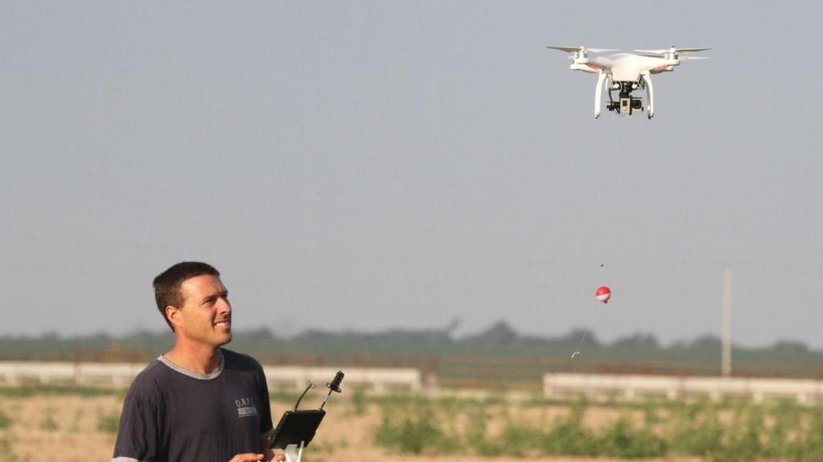 
Derek Klingenberg demonstrates the drone he used to go fishing. His YouTube video, “I caught a fish with my drone” has been viewed online more than 1.5 million times since Aug. 31.
