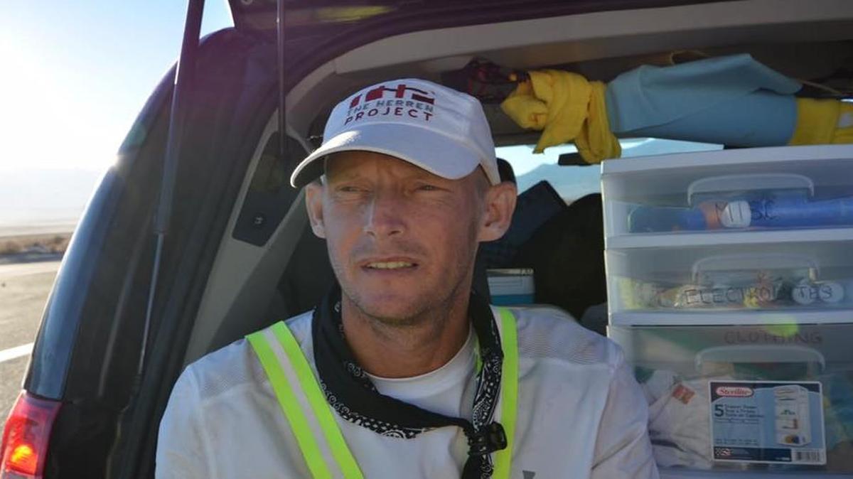 George Myers takes a few minutes during the Badwater 135 ultramarathon that took him through Death Valley, then to about 8,300 feet into the mountains.