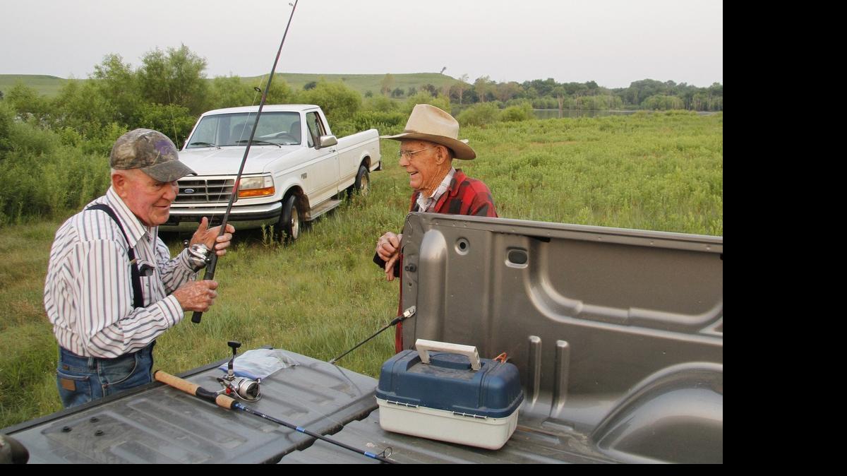 
Jim Barr, 91, left, and Gene Barr, 88, talk fishing early Tuesday morning. The brothers share about 170 years of bass fishing experience in the Flint Hills.
