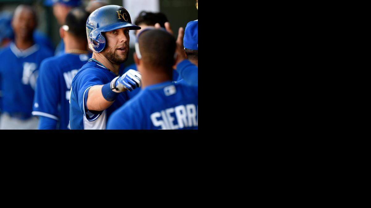 
Kansas City Royals center fielder Reymond Fuentes (34) bumps fists with Kansas City Royals right fielder Moises Sierra (43) while celebrating his solo home run during the Kansas City Royals and Texas Rangers spring training baseball game at Surprise Stadium on Monday, March 30, 2015, in Surprise, Arizona. 
