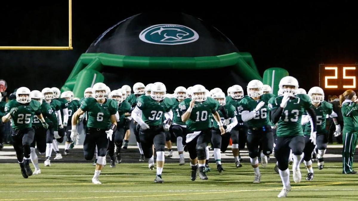 Derby takes the field before their 6A semifinal game against Lawrence Free State on Nov. 18.