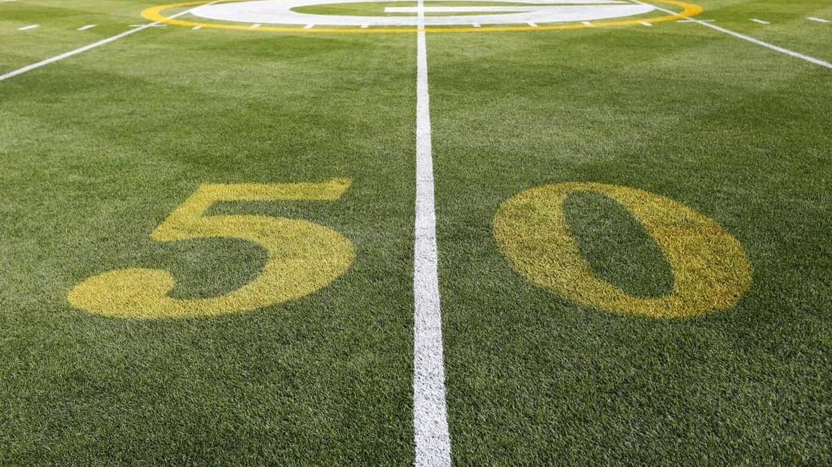 
The 50-yard line before an NFL football game between the Green Bay Packers and the Seattle Seahawks.
