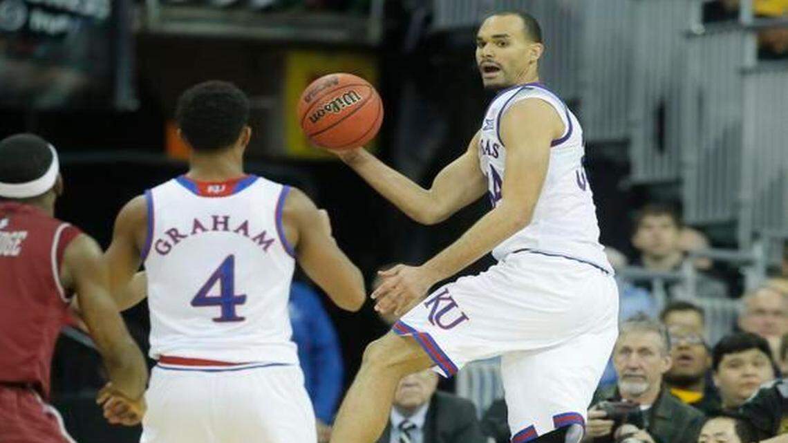 
Kansas forward Perry Ellis saves a ball from going out of bounds against New Mexico State during the second half Friday in Omaha.
