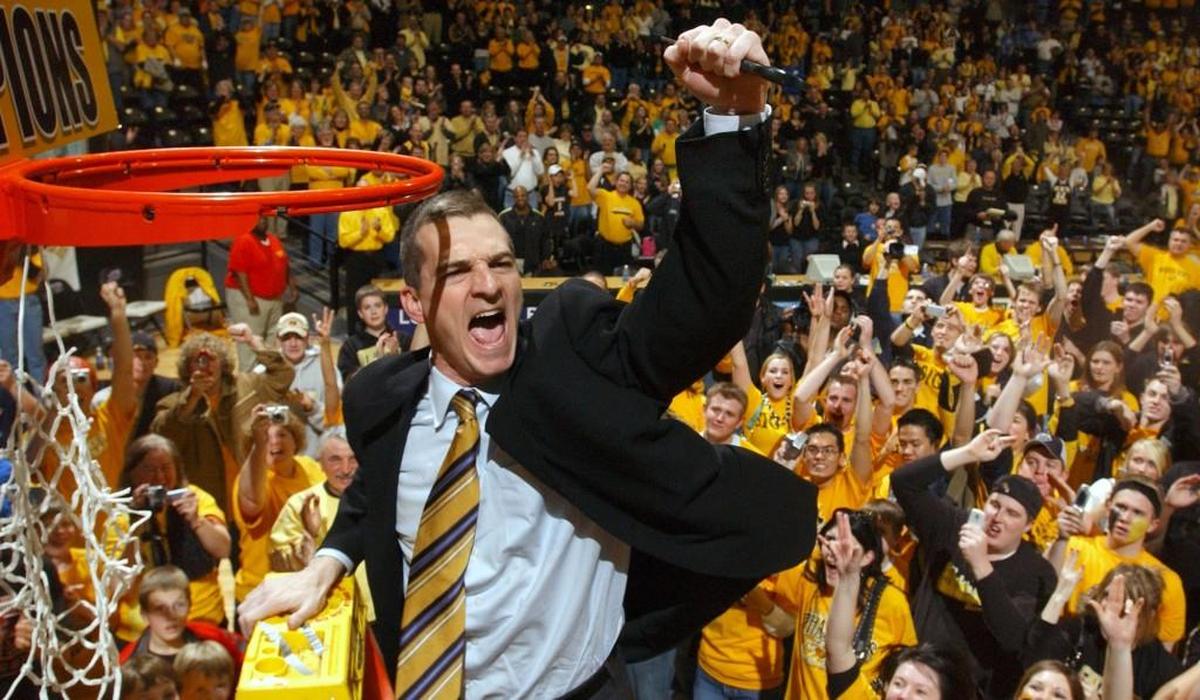 Mark Turgeon celebrates with WSU fans after his team clinched the Missouri Valley Conference regular season title in 2006.