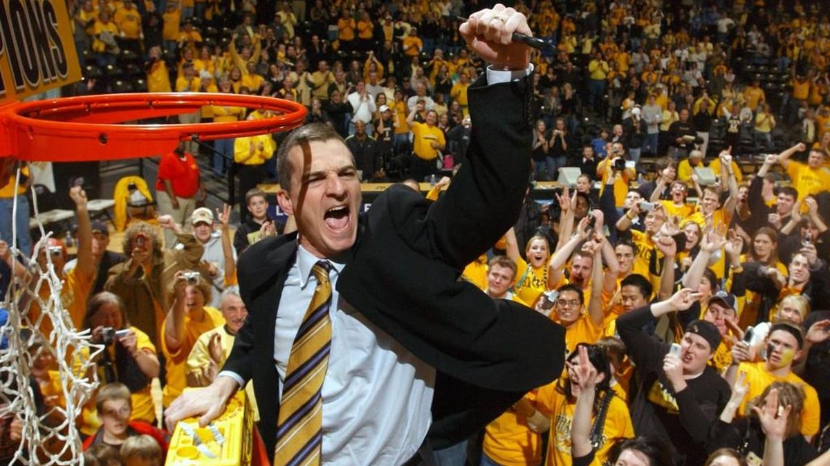 Mark Turgeon celebrates with WSU fans after his team clinched the Missouri Valley Conference regular season title in 2006.