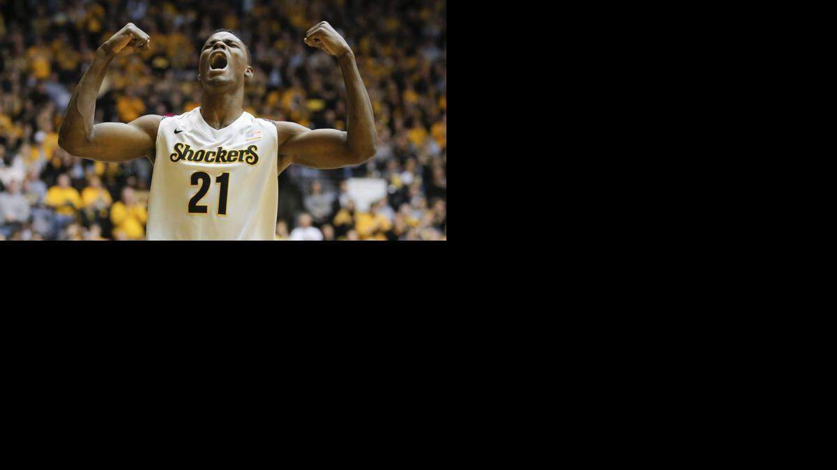 Wichita State center Bush Wamukota celebrates a turnover against Northern Iowa during the first half at Koch Arena on Saturday. 