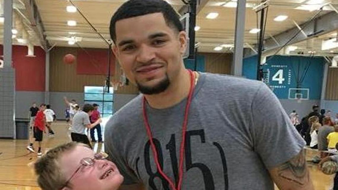Fred VanVleet poses with 9-year-old Keaton Palmer last weekend during Ron Baker’s youth basketball camp.