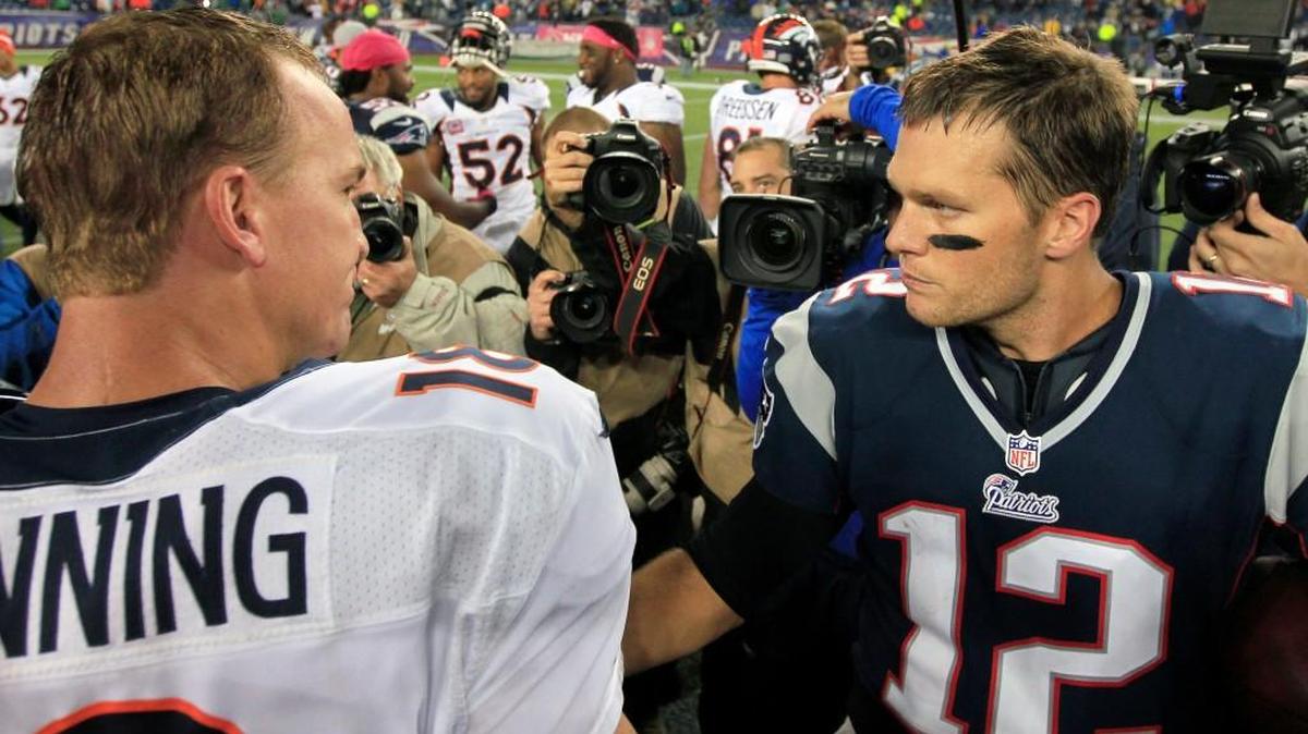 Denver’s Peyton Manning, left, and New England’s Tom Brady after a 2012 regular-season meeting in Foxborough, Mass.