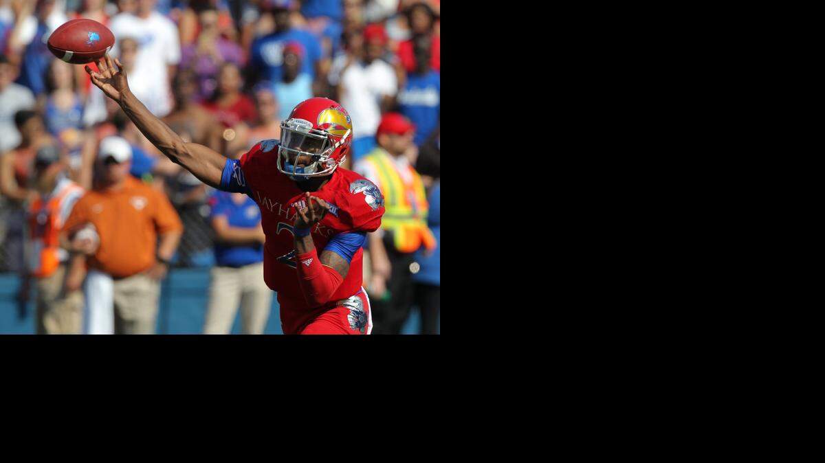 
Kansas quarterback Montell Cozart completed 12 of 31 passes Saturday for 140 yards.

