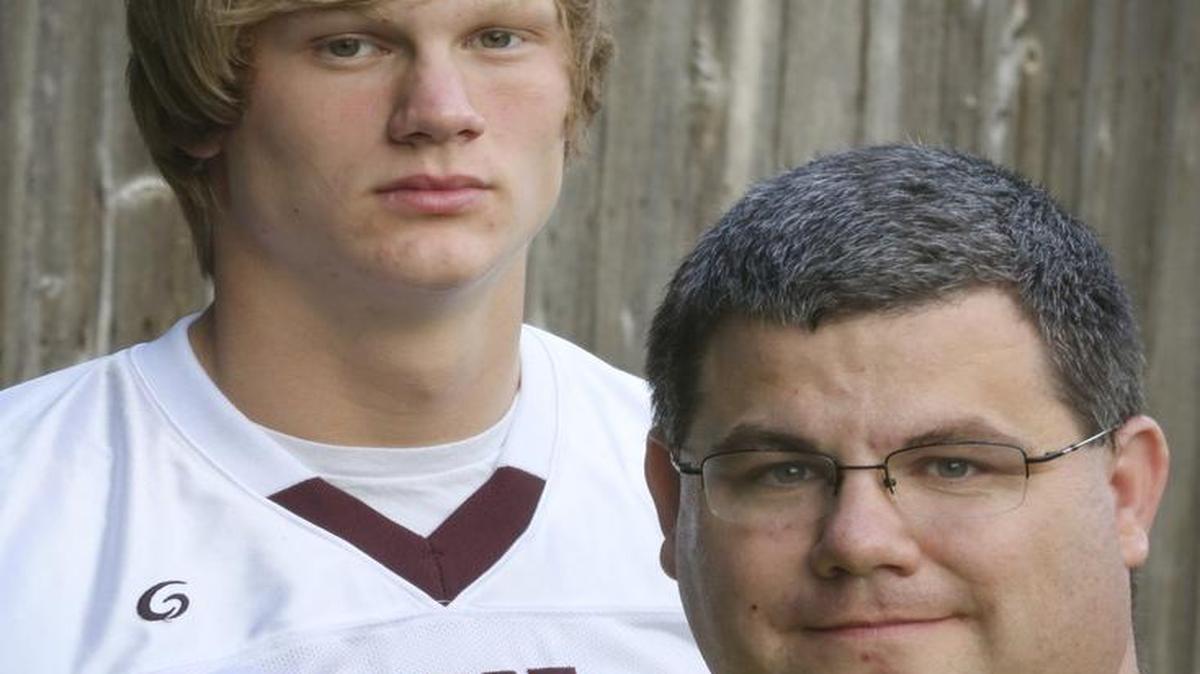 
West High quarterback Chaz Capps, left, was adopted by Mike Capps in 2006.

