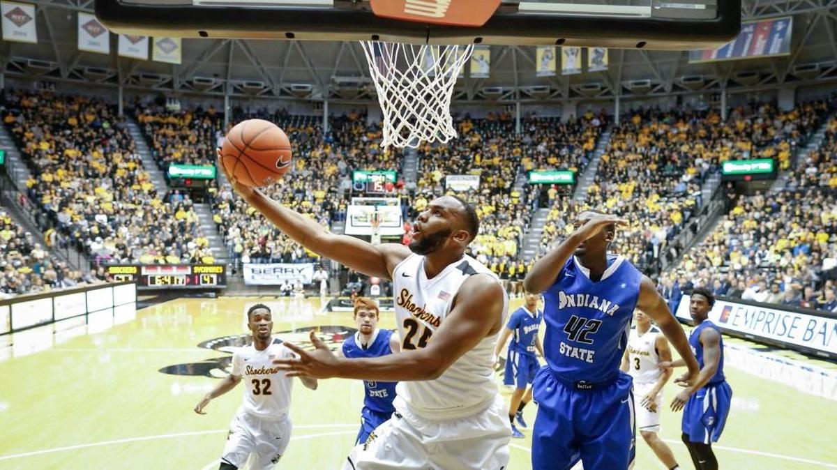 Wichita State center Shaq Morris goes to the basket against Indiana State center T.J. Bell during the second half Saturday.