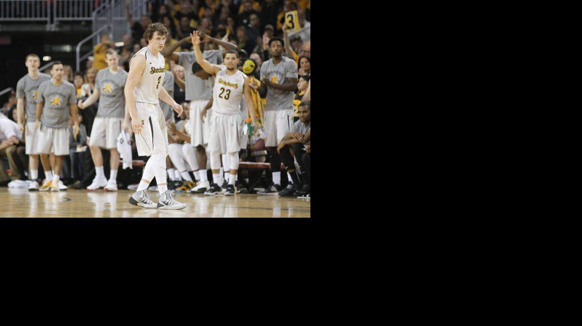 
Evan Wessel's Wichita State teammates celebrate after he hits one of his four three-pointers against Saint Louis during the first half Saturday at Intrust Bank Arena.
