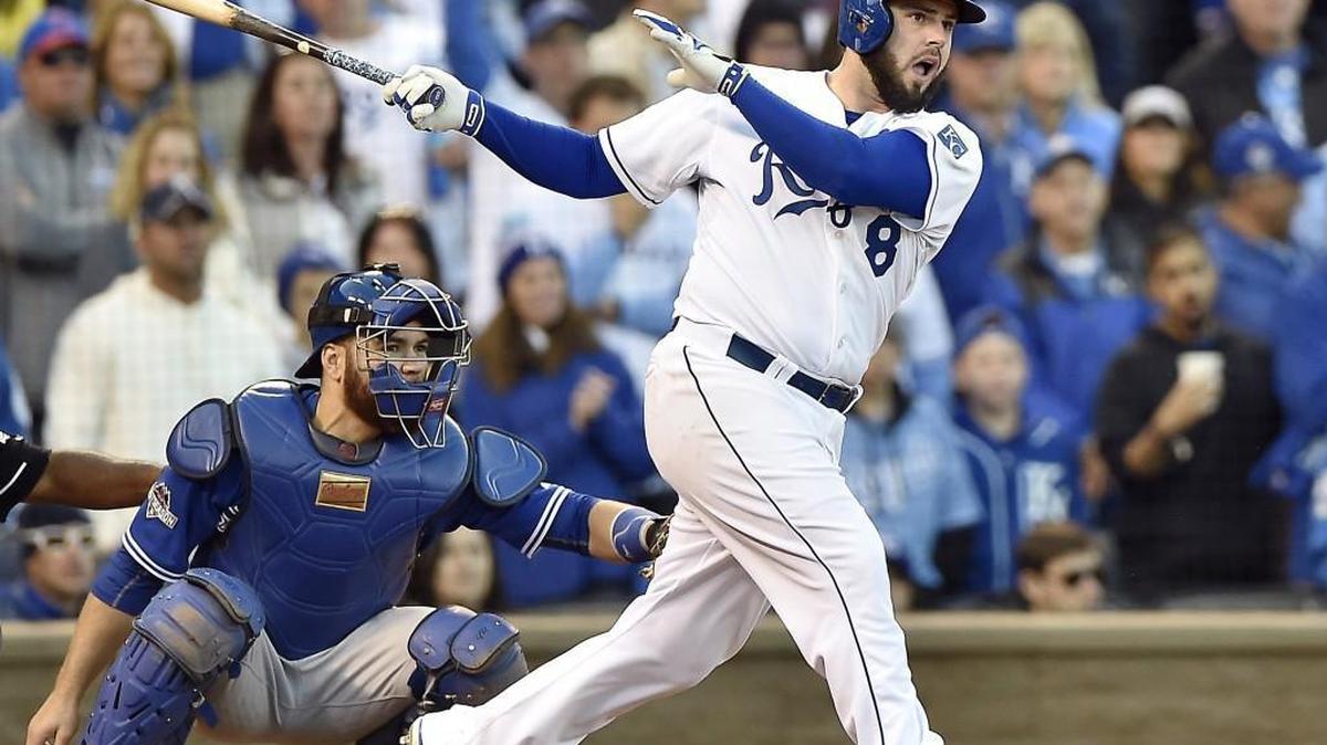
The Royals’ Mike Moustakas hits an RBI single in the eighth inning against Toronto.
