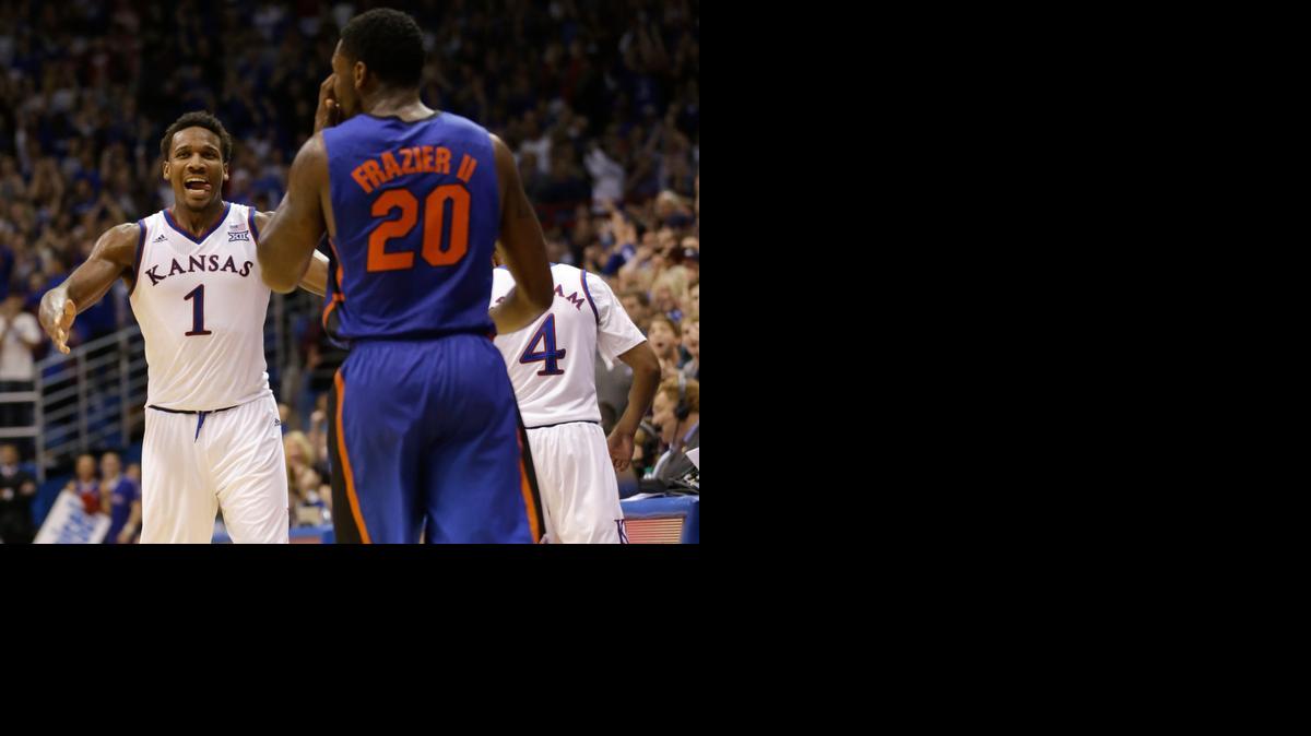 
Kansas guard Wayne Selden Jr. (1) celebrates in front of Florida guard Michael Frazier II during the second half Friday in Lawrence. Seldon scored 21 points in the game.
