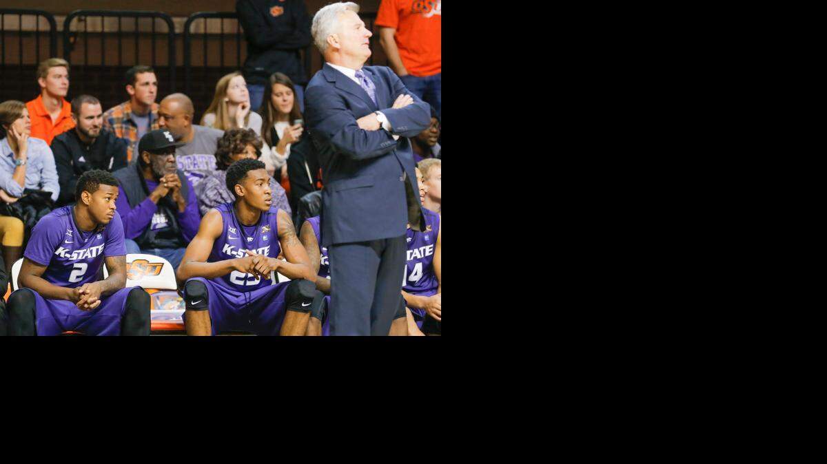 
Kansas State guard Marcus Foster, left, spent 26 of the game’s 40 minutes on the bench Saturday at Oklahoma State.

