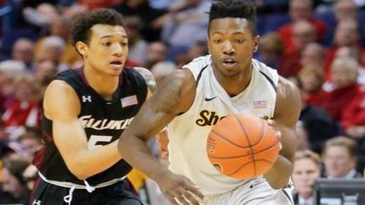 
Wichita State forward Zach Brown drives to the basket during the first half Friday. Brown had eight points in the Shockers’ 11-point victory over Southern Illinois.

