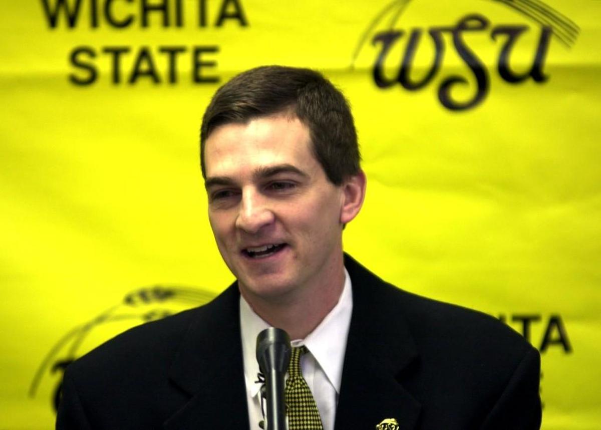 Mark Turgeon answers questions from reporters after being named WSU basketball coach in March 2000.