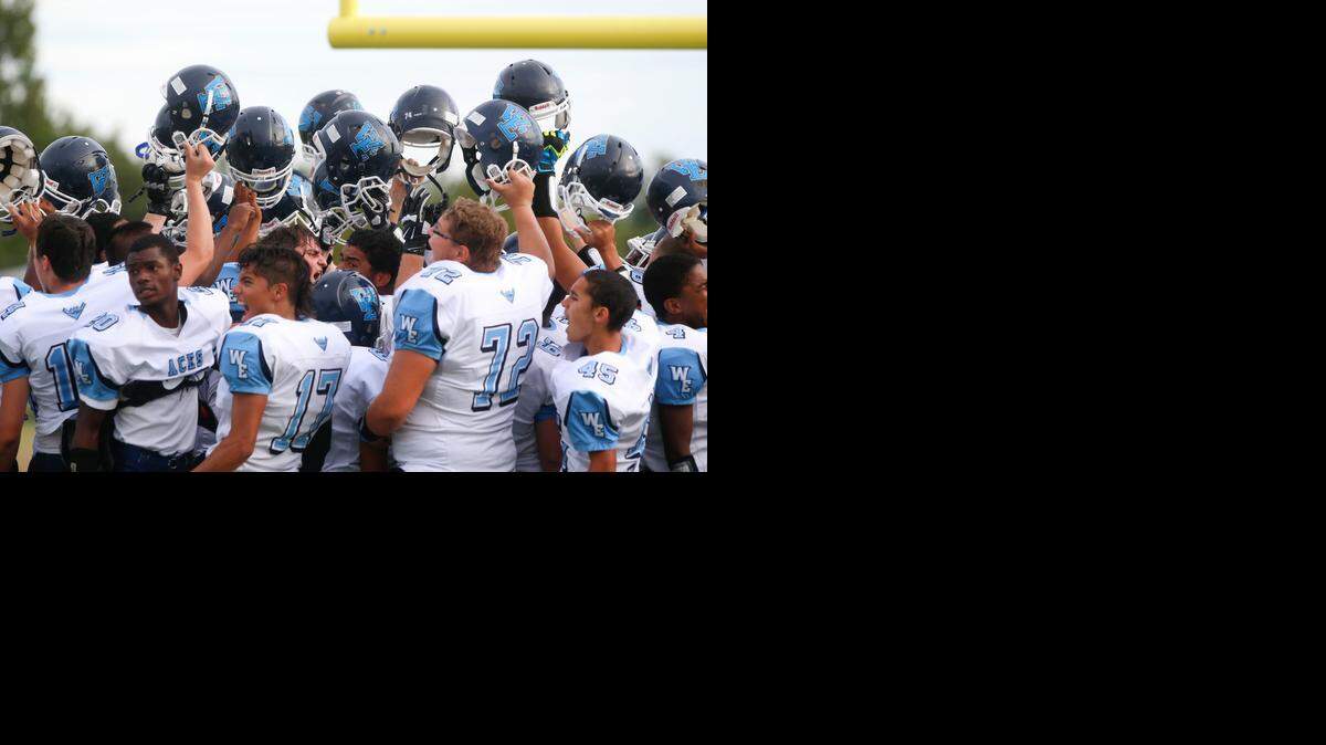 
East players huddle before their game against West last season.
