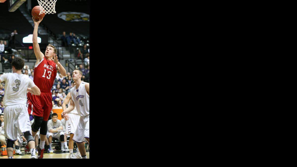 
Maize's Connor Lungwitz (13) scores on Blue Valley Northwest in the first quarter of last March’s Class 6A semifinals.

