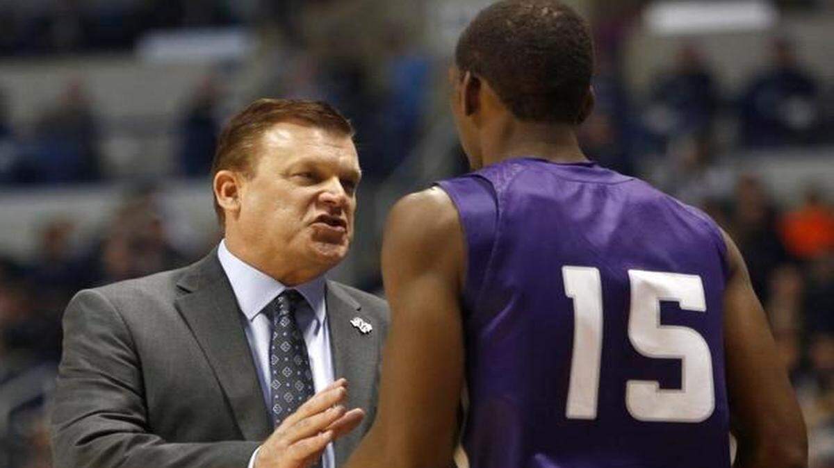 
Stephen F. Austin coach Brad Underwood, left, talks with forward Bobby King during a November game. The Lumberjacks are 20-3 under the McPherson native.

