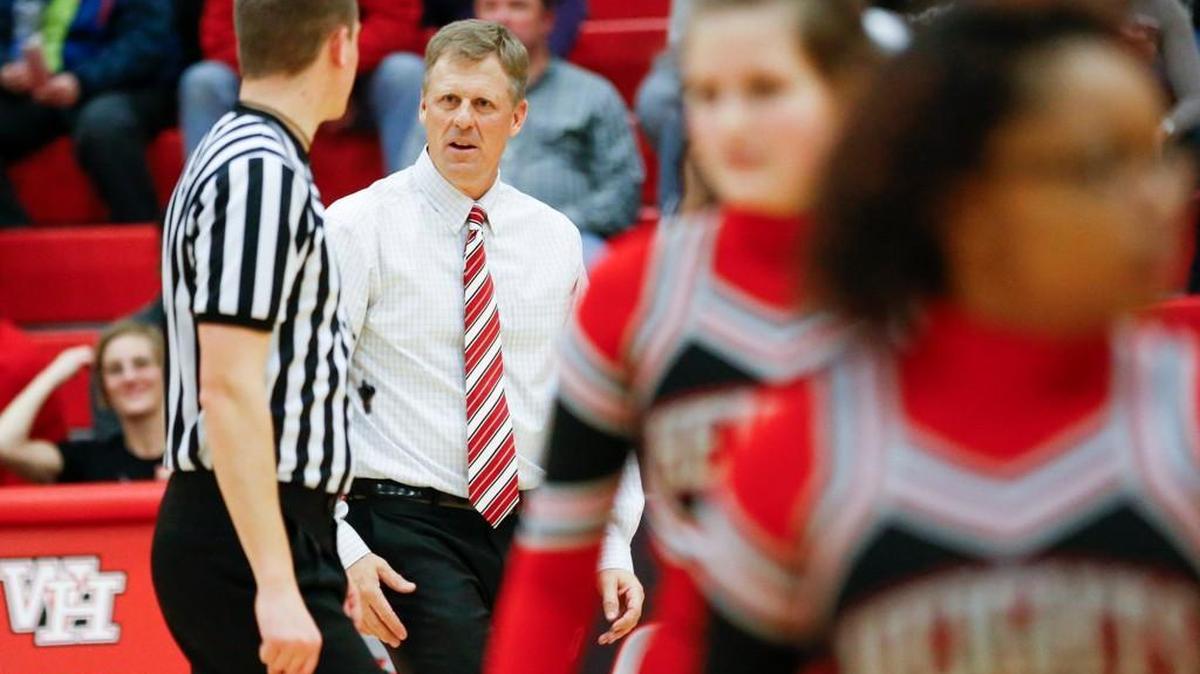 Heights coach Joe Auer talks with an official during a game last week. Auer’s Falcons are 8-1 this season.