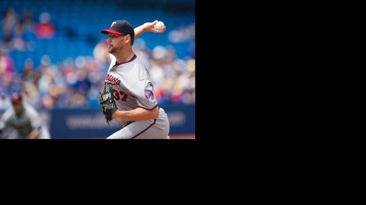 
Minnesota Twins pitcher Mike Pelfrey begins his 10th major-league season this spring.
