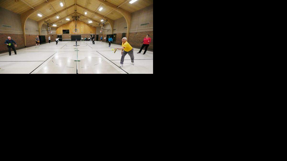 
Pickleball players participate at the Edgemoor Park recreation center last week. Local tennis pros are hoping the game can catch on in Wichita.
