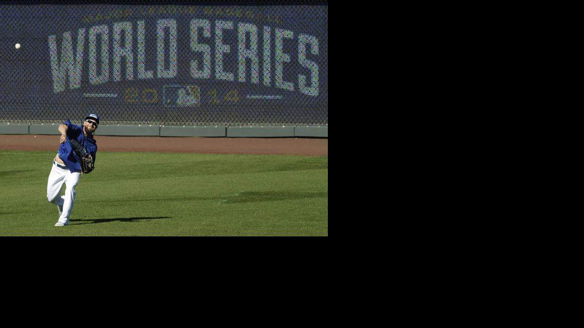 
Kansas City’s Alex Gordon throws during Monday’s workout at Kauffman Stadium. The Royals will host San Francisco in Game 1 on Tuesday.
