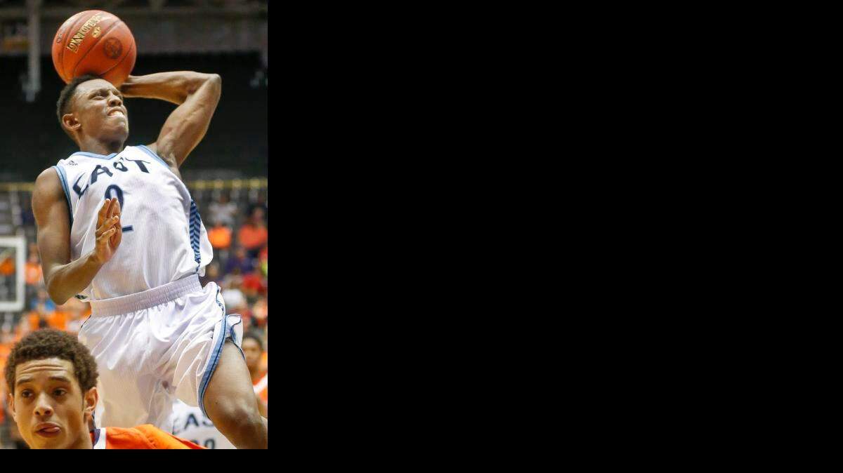 
East's Samajae Jones goes up for a layup with time running out. East beat Olathe East on Friday to advance to the 6A championship game.

