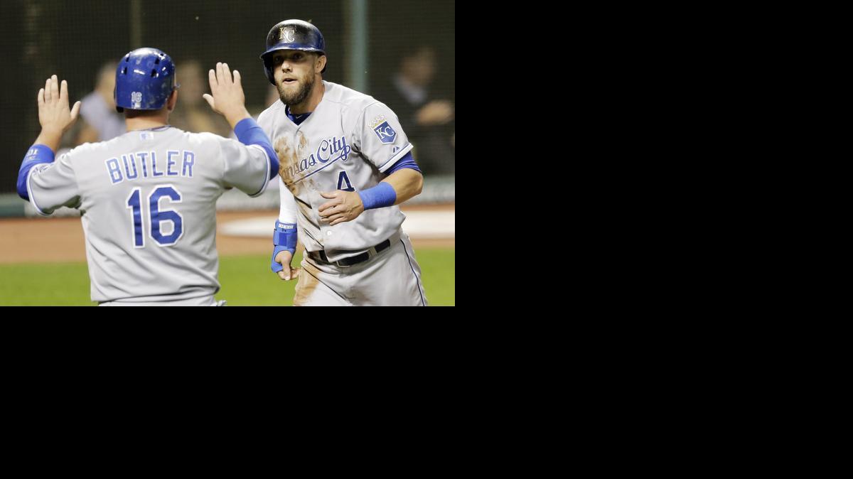 
The Royals’ Billy Butler, left, greets Alex Gordon after both scored on a two-run double hit by Salvador Perez in the fifth inning Tuesday in Cleveland. 
