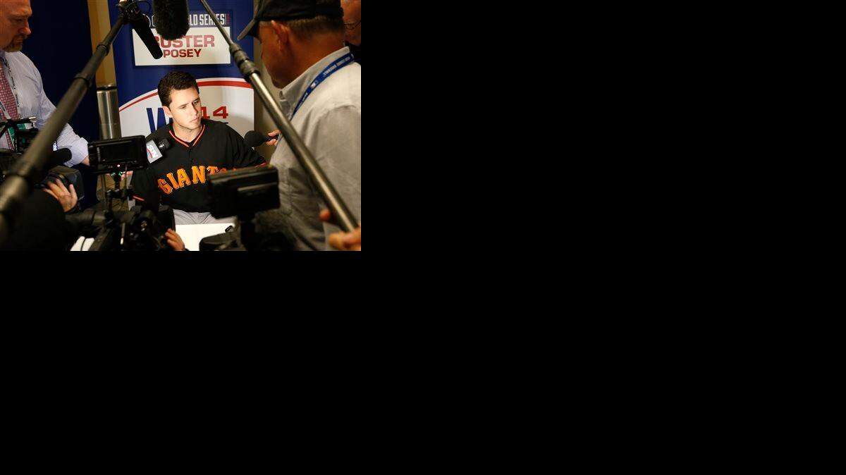 
San Francisco Giants catcher Buster Posey talks to the media during baseball player availability at Kauffman Stadium on Monday.
