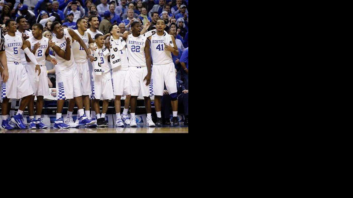 
Kentucky’s players look happy and with good reason. The Wildcats put away Kansas, 72-40, Tuesday night in the Champions Classic in Indianapolis.
