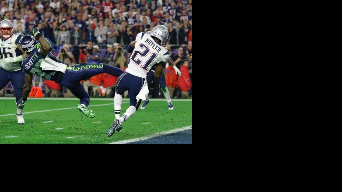 
Patriots strong safety Malcolm Butler (21) intercepts a pass in front of Seahawks wide receiver Ricardo Lockette (83) that sewed up Super Bowl XLIX for New England on Sunday night.
