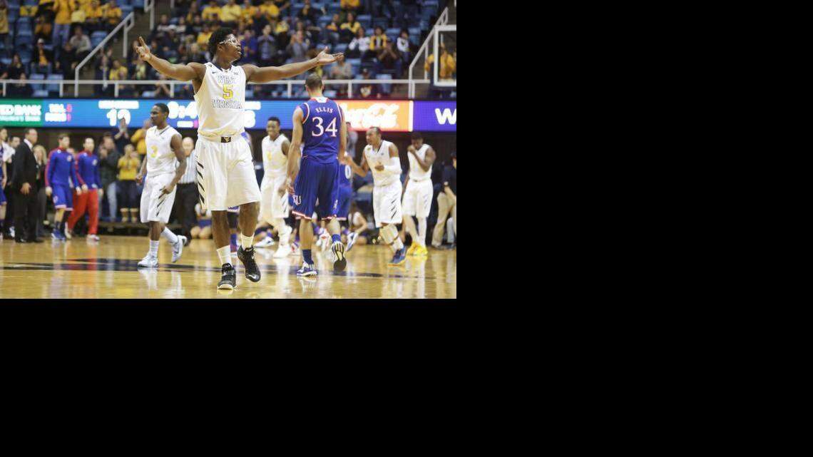 
West Virginia forward Devin Williams celebrates during the first half of Monday’s 62-61 win over Kansas.




