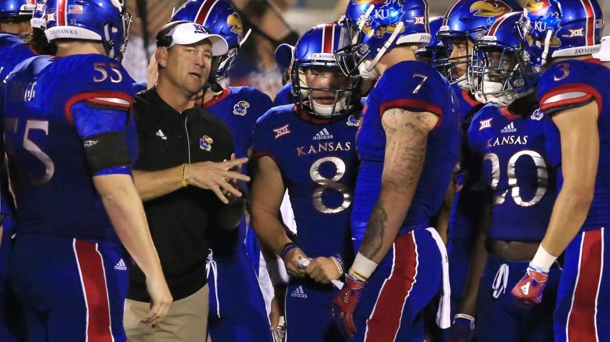 Kansas head coach David Beaty talks to his team during the second half of an NCAA college football game against Rhode Island in Lawrence on Sept. 3. Beaty won his first game as a head coach with Kansas defeating Rhode Island 55-6.