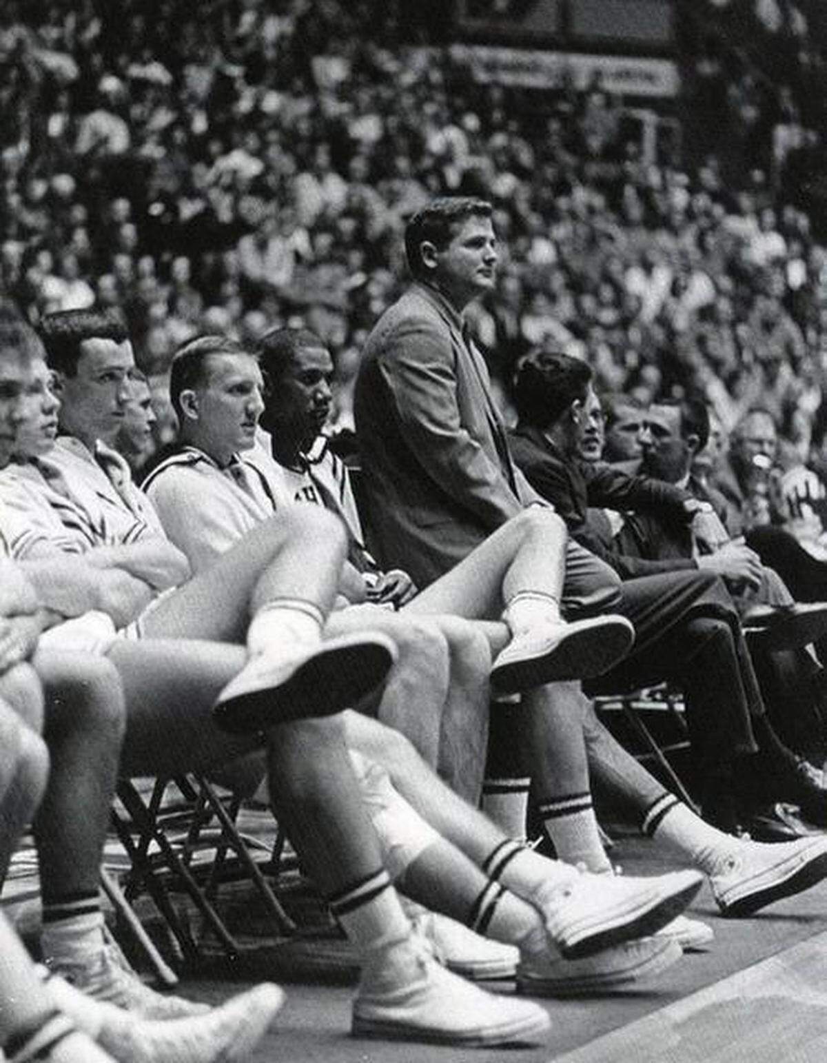 Wichita State coach Gary Thompson looks on during a Shockers’ game during the 1964-65 season. Seated to his right is All-American forward Dave Stallworth.