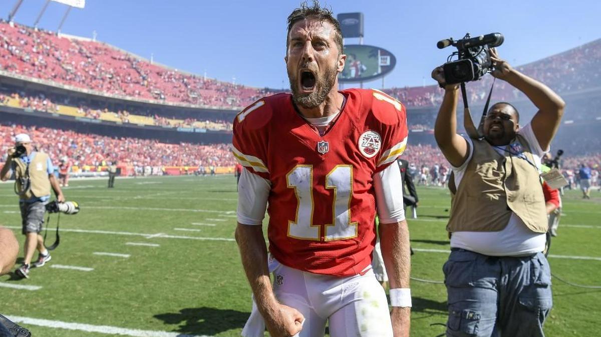 Kansas City Chiefs quarterback Alex Smith shouts in celebration after his two-yard touchdown run in overtime won the game, 33-27, over the San Diego Chargers on Sunday at Arrowhead Stadium.