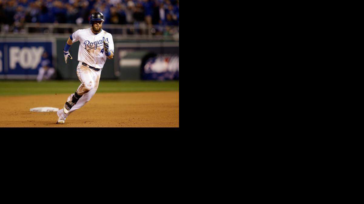 
Alex Gordon chugs toward third base Wednesday night after his single in the ninth inning of Game 7 of the World Series skipped past San Francisco Giants center fielder Gregor Blanco. Gordon was held at third and watched as Salvador Perez fouled out to end the game and the Series.
