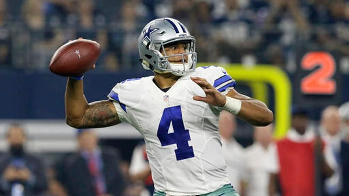 Dallas Cowboys quarterback Dak Prescott throws a pass against the Chicago Bears in the second half Sunday night in Arlington, Texas.