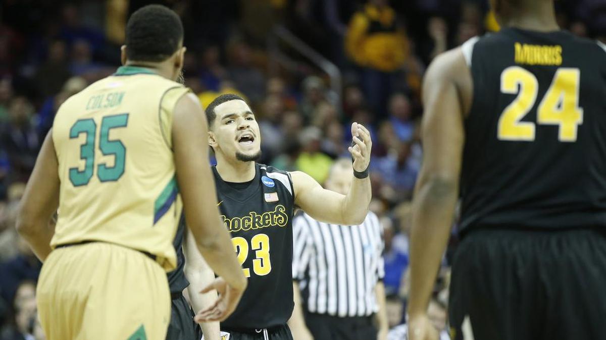 Wichita State guard Fred VanVleet (23) talks to teammate Shaquille Morris during March’s Sweet 16 game against Notre Dame.